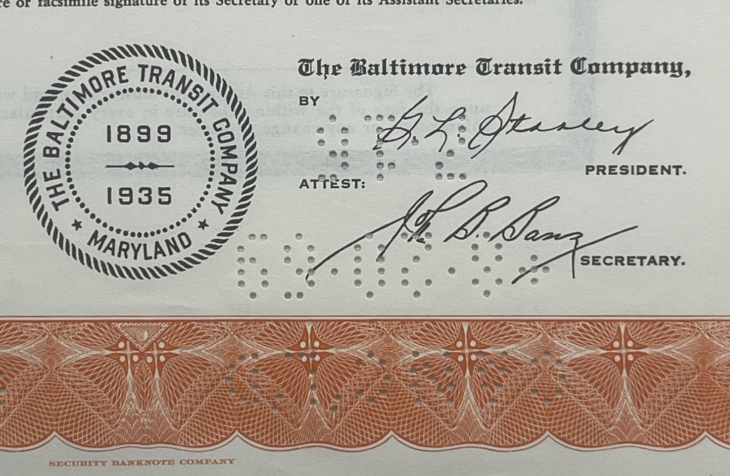 Upper portion of vintage Baltimore Transit Company bond certificate with 1899-1935 seal, signatures, and decorative lower bor