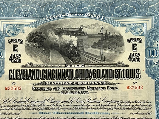 Antique railroad bond certificate with ornate blue border, steam locomotive engraving, "Series E 4½%" text, and "$1000" denom