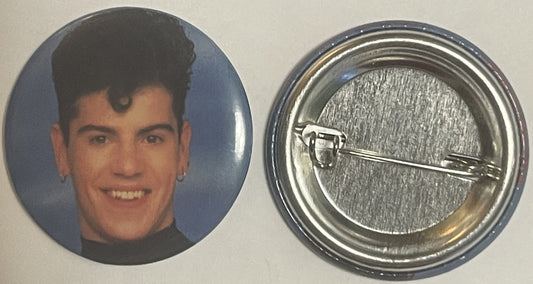 Front and back of vintage New Kids on the Block Jordan Knight button pin, showing portrait photo and metal backing with pin c