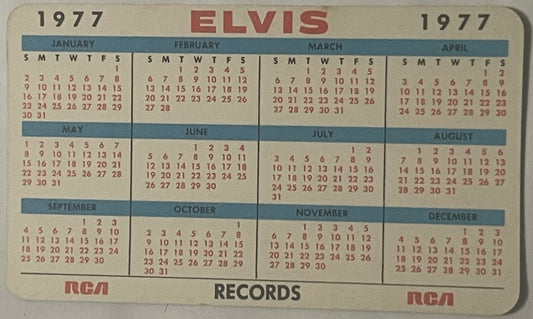 Vintage 1977 Elvis Presley pocket calendar from RCA Records showing all twelve months in blue and cream with red text