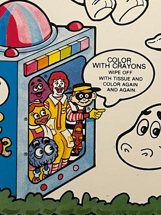 Vintage McDonald's wipe-away coloring board featuring Ronald McDonald and characters with instruction text and crayon color p