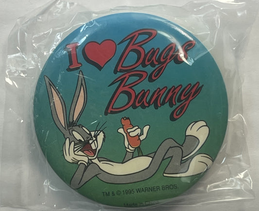 Sealed plastic package containing a circular pin featuring Bugs Bunny with "I ❤ Bugs Bunny" text on teal-green background, 19