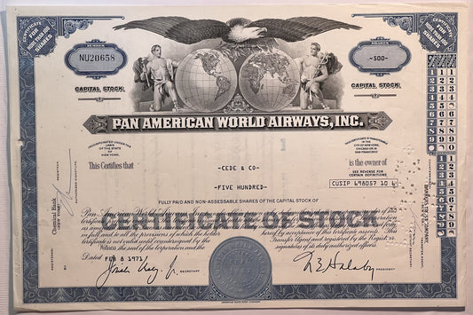 Vintage Pan American World Airways stock certificate with blue borders, eagle emblem, globe imagery, and signatures dated Feb