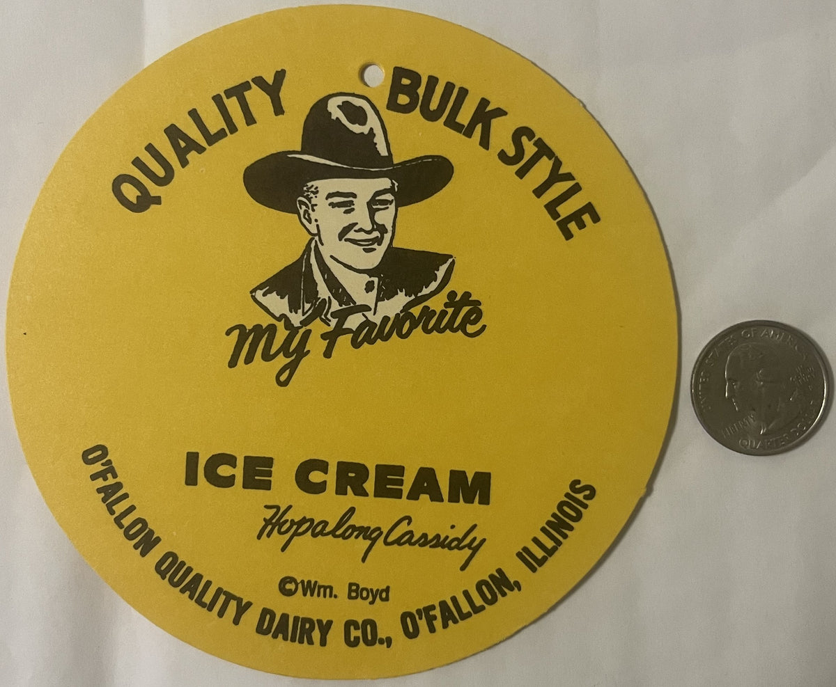 Yellow circular sign featuring cowboy illustration with text "Quality Bulk Style Ice Cream" and "Hopalong Cassidy," with penn