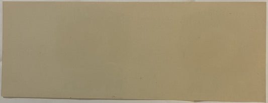 Cream-colored rectangular vintage label with minimal visible text, photographed flat against white background