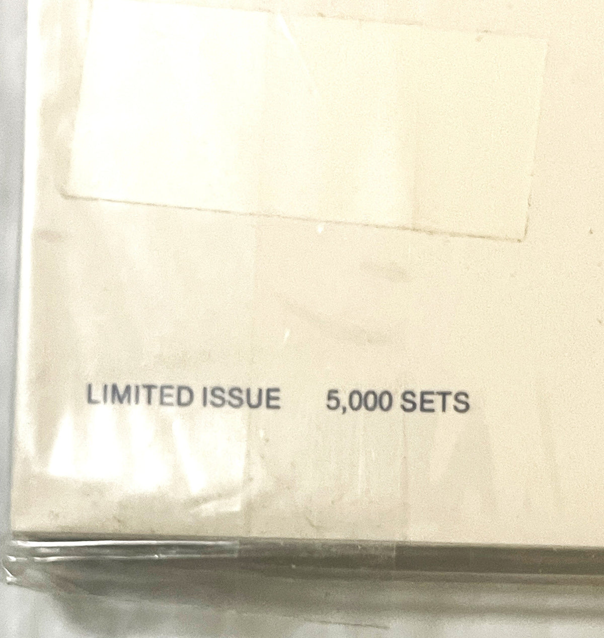 Close-up of packaging showing "LIMITED ISSUE 5,000 SETS" printed in gray text on cream-colored cardboard