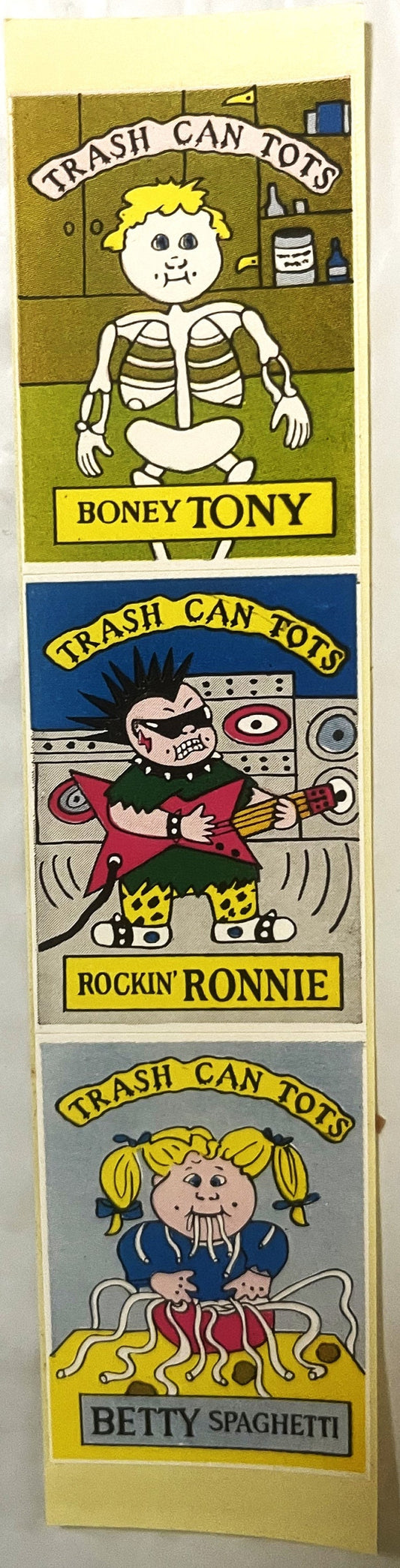 Three vintage Trash Can Tots sticker designs featuring cartoon characters Boney Tony, Rockin' Ronnie, and Betty Spaghetti in