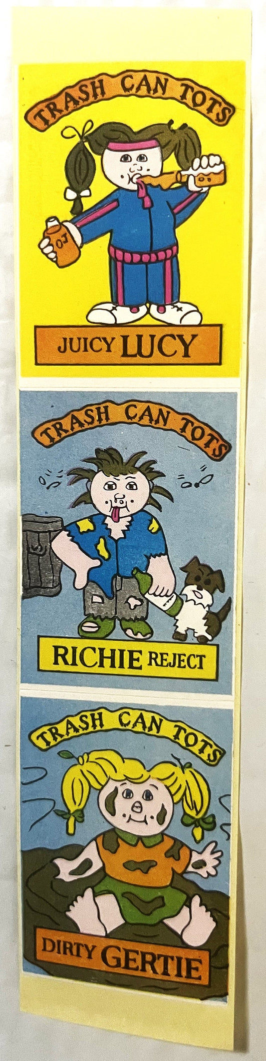 Three sticker sheets showing cartoon characters labeled Juicy Lucy, Richie Reject, and Dirty Gertie from the Trash Can Tots s