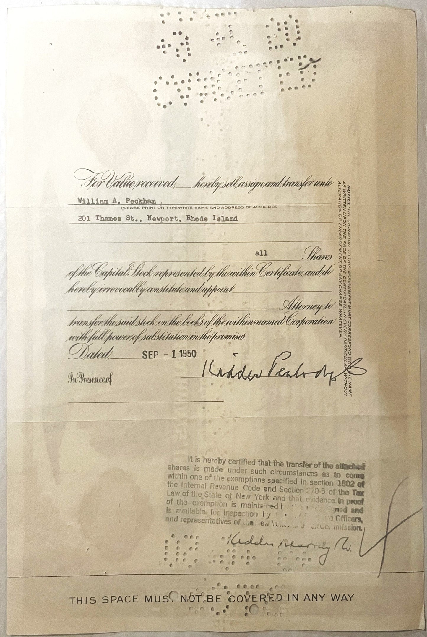 Vintage stock certificate, with ornate script and printed text on aged cream paper, signed in cursive