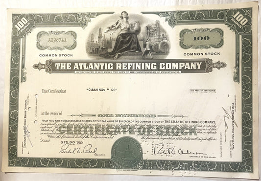 Vintage stock certificate for The Atlantic Refining Company from, featuring ornate borders, allegorical imagery, and sig