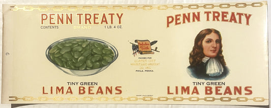 Vintage Penn Treaty Brand lima beans can label from Philadelphia featuring a bowl of green beans, a cow logo, and a colonial-