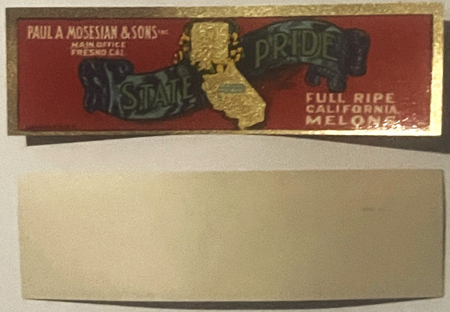 Vintage fruit crate label with red background, gold California state outline, and "Pride" branding for full ripe California m