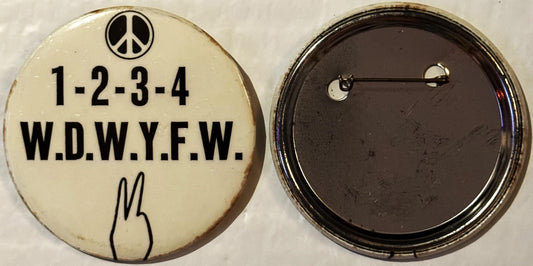 Front and back of cream-colored pinback button with peace symbol, numbers 1-2-3-4, text "W.D.W.Y.F.W." and peace hand gesture