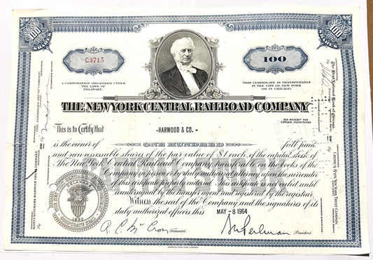 Vintage New York Central Railroad stock certificate for 100 shares, featuring portrait and blue ornamental border design