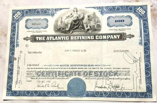 Vintage blue and white stock certificate from The Atlantic Refining Company dated April