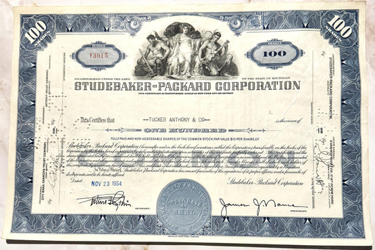 Studebaker-Packard Corporation stock certificate for 100 shares, featuring blue ornamental borders an
