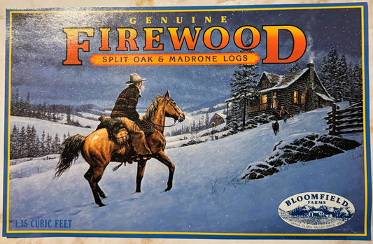 Vintage firewood crate label with cowboy on horseback in snowy landscape approaching log cabin, gold and blue border, Bloomfi