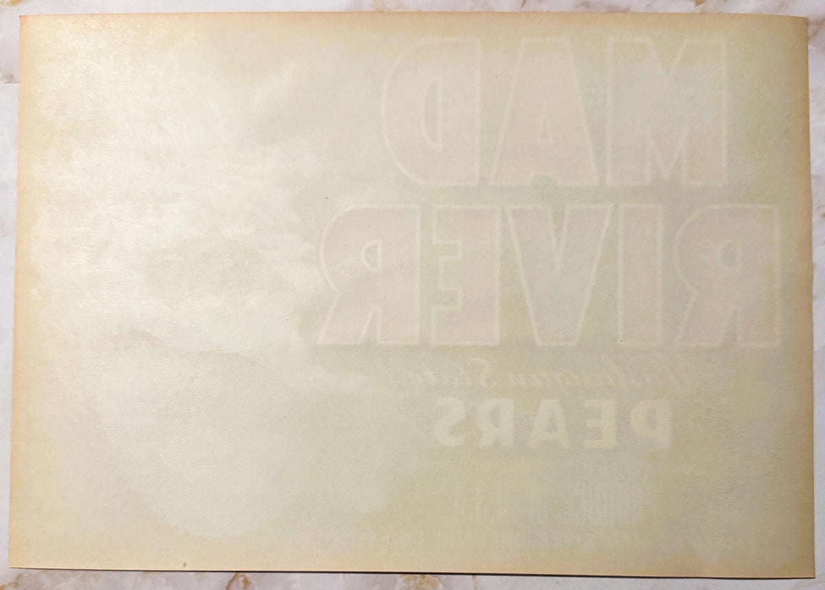 Cream-colored vintage crate label with embossed text reading "Mad River" and "Pears," showing age-related discoloration and w