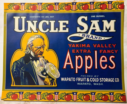 Vintage Uncle Sam Brand apple crate label with bearded Uncle Sam holding an apple, red and blue design with yellow border and