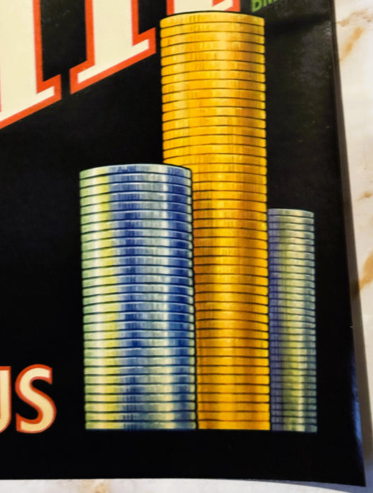 Vintage crate label featuring three stacked coins in blue and gold against black background with red geometric design element