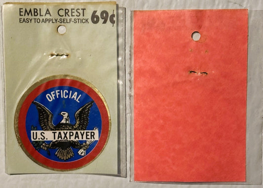 Vintage self-stick emblem crest priced 69¢ showing Official US Taxpayer eagle seal on cream backing card, with blank red back