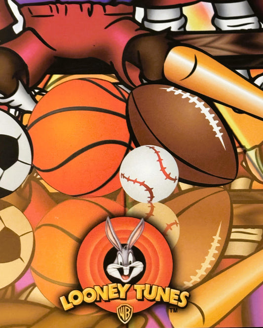 Colorful 1990s Looney Tunes sports poster featuring Bugs Bunny logo surrounded by basketballs, footballs, baseballs, and base