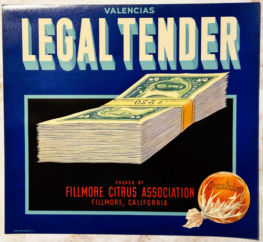 Vintage fruit crate label with dark blue background showing a stack of paper currency tied with gold band, orange fruit with