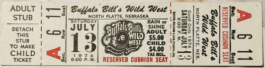 Vintage 1974 Buffalo Bill's Wild West show ticket stub for North Platte, Nebraska, July 13, with red and black printing on cr