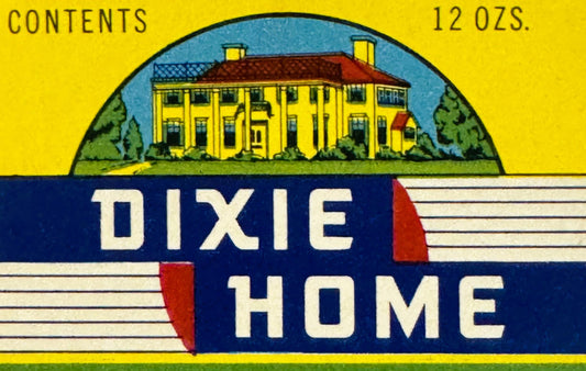 Vintage Dixie Home peanut butter label with yellow and blue design featuring a colonial mansion, 12 oz contents noted