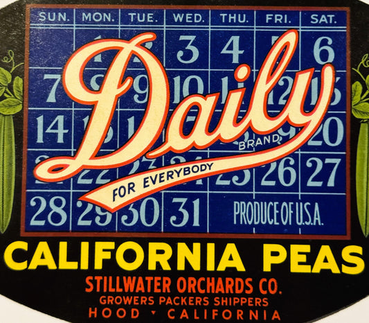 Vintage Daily Brand peas crate label with calendar grid, red and cream lettering on blue background, from Stillwater Orchards