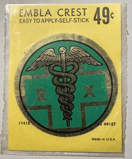 Vintage yellow self-stick decal with green circular medical caduceus emblem, priced at 49 cents, made in USA.