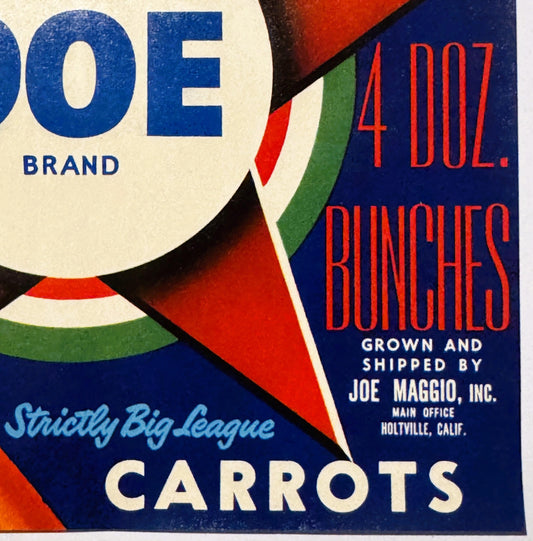 Vintage Doe Brand carrot crate label featuring bold geometric design in red, green, blue and cream with Art Deco styling and