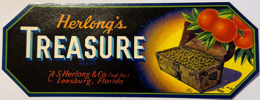 Vintage Herlong's Treasure fruit crate label featuring a pirate chest, oranges, and gold coins on black background with blue