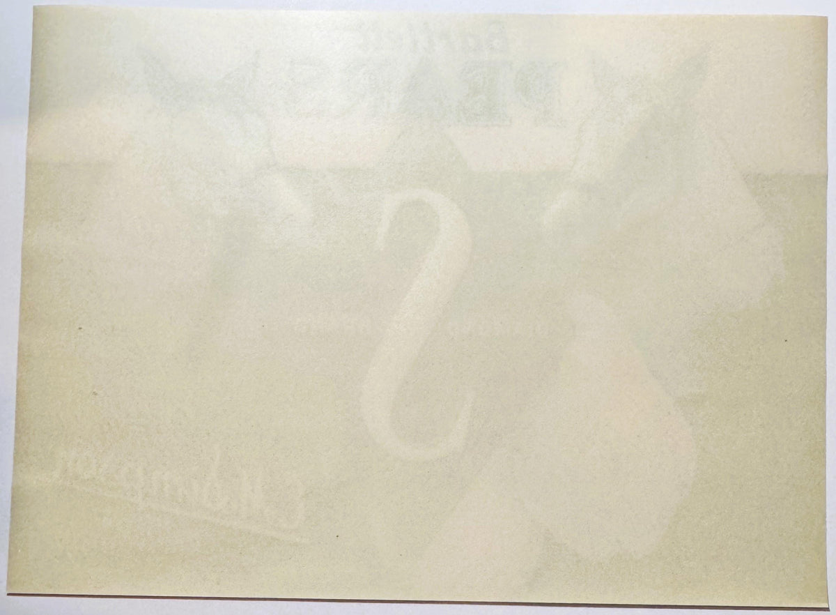 Back of the Diamond S label: plain paper with the design showing faintly through in reverse