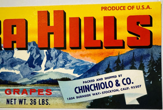 Vintage fruit crate label with "HILLS" in large red letters on yellow background, mountain landscape, "GRAPES NET WT. 36 LBS"