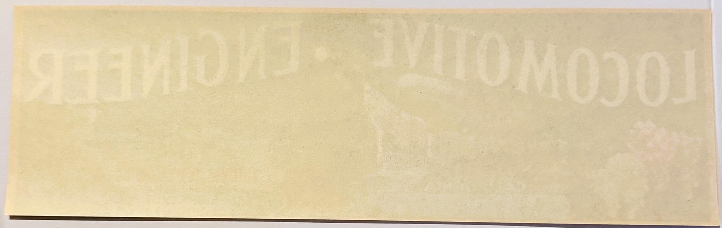 Faded cream-colored vintage crate label with embossed text reading "FRESNO" and partial locomotive imagery, showing age and w
