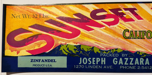 Vintage fruit crate label with bold red "Sunset" lettering on gold background, Joseph Gazzara packer info and California map