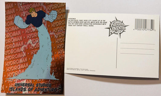 Front and back of a foil Hydroman postcard showing the villain in water with "HYDROMAN" repeated on orange background, and Is