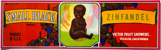 Fruit crate label reading "Small Black Brand Zinfandel", seated infant vignette, Victor Fruit Growers