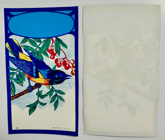 Open vintage broom label with blue border, colorful bluebird on branch with red berries, blank cyan panel at top, printed in