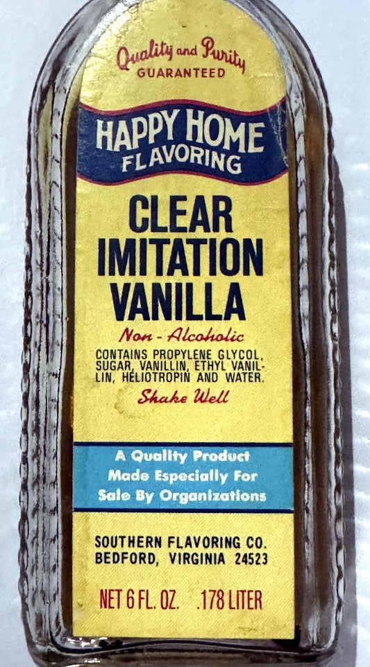Happy Home Flavoring label up close: Non-Alcoholic clear imitation vanilla, made especially for sale by organizations