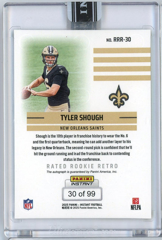 Back of sports trading card showing Tyler Shough in black Saints jersey, gold striped design, card number 30 of 99, encased in clear plastic holder.