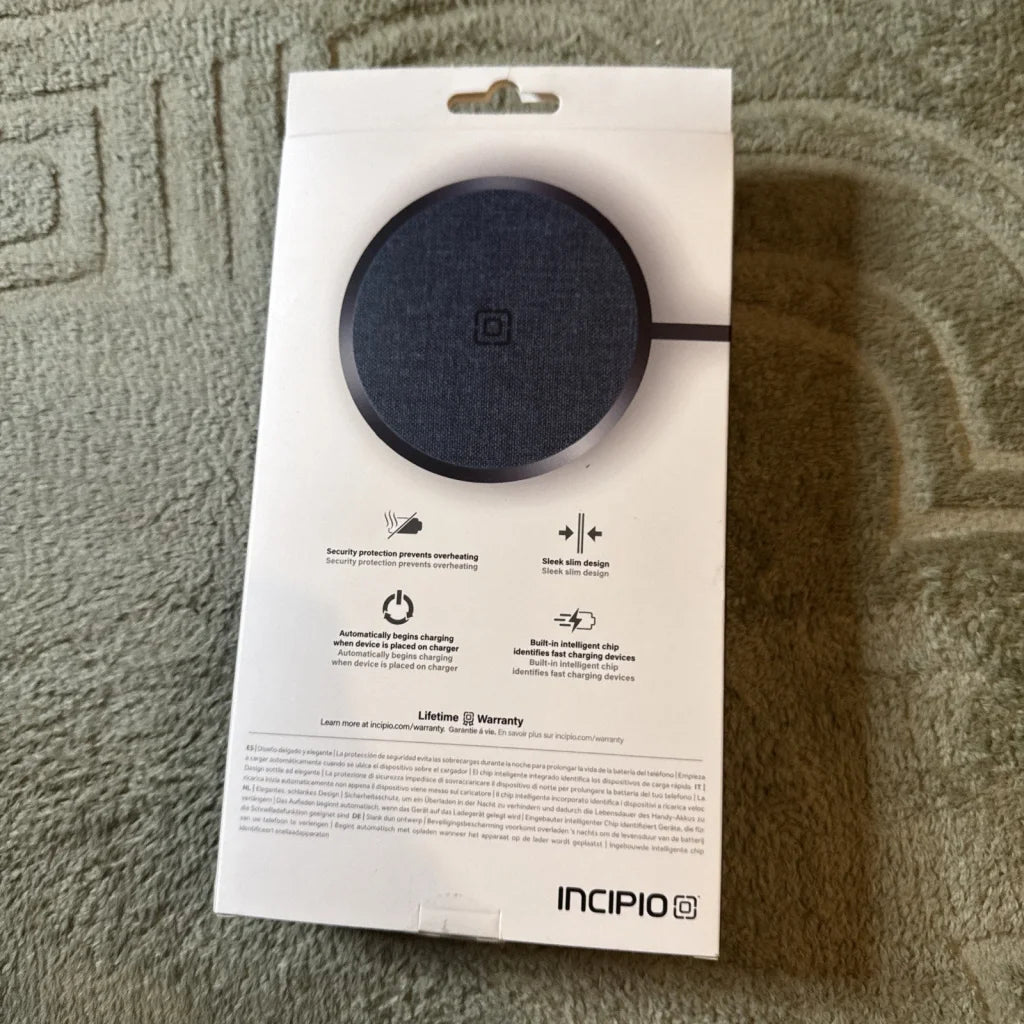 Incipio 15W wireless charging pad with matte black finish and logo