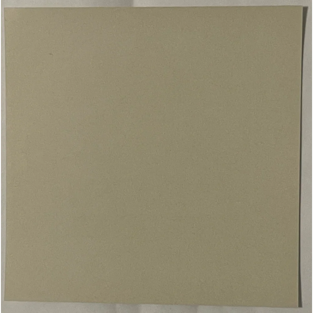 Solid beige square tile showcasing the Infamous Vintage Bad Frog Beer Label design