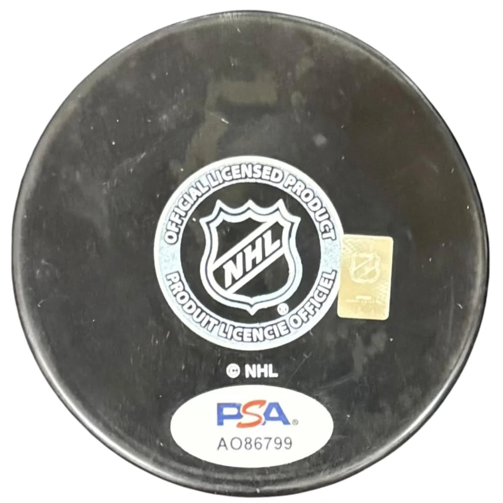 Black jsa authenticated hockey puck featuring a white logo and jake guentzel autographed tampa bay lightning design