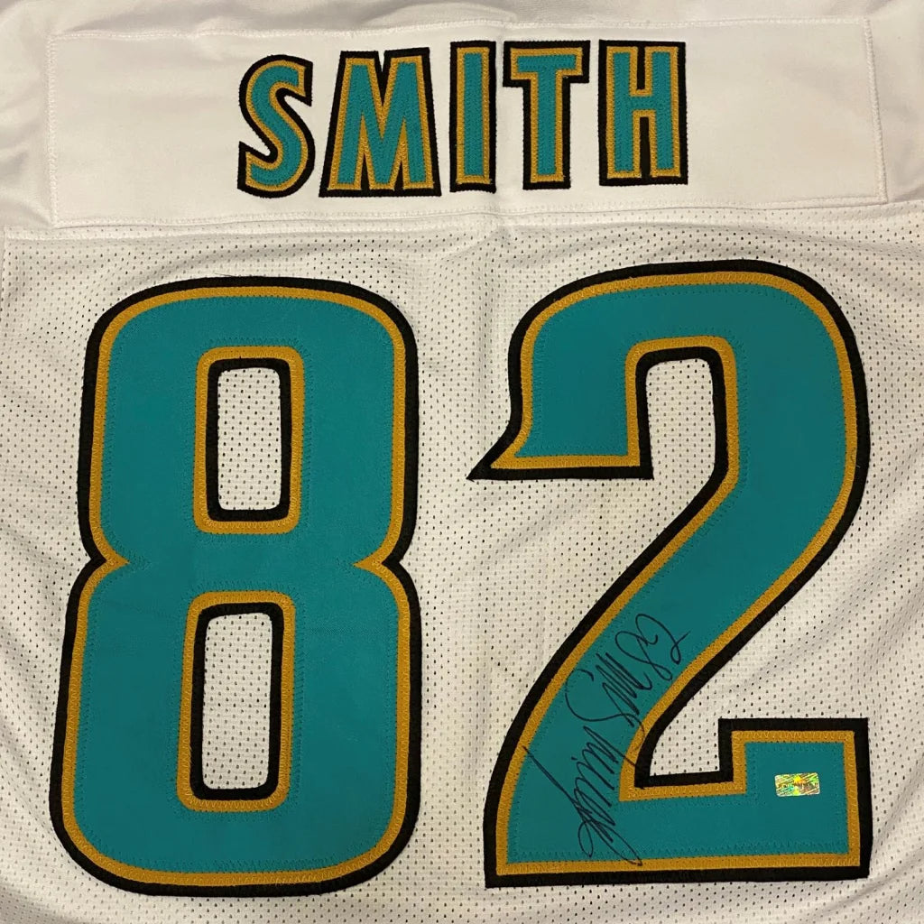 Signed Jimmy Smith custom jersey in white, teal and gold