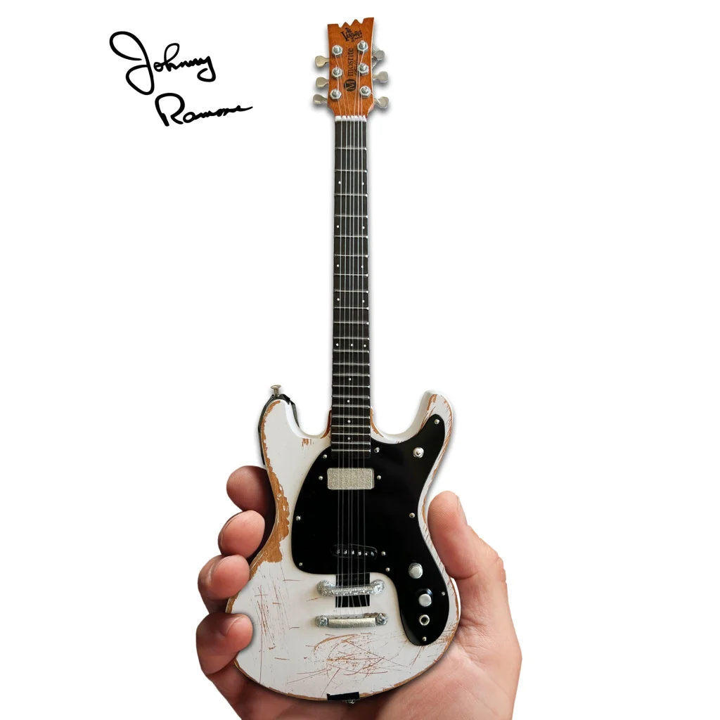 Johnny Ramone Axe Heaven mini guitar with stand, distressed white black finish