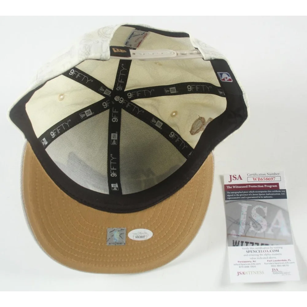 Underside of Jrue Holiday Signed Celtics Championship Adjustable Hat with authenticity stickers