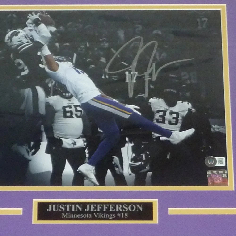 Framed Justin Jefferson autographed Minnesota Vikings spotlight catch photo