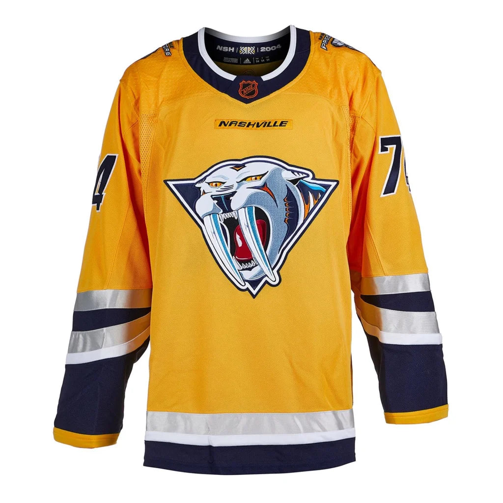Juuse Saros autographed Nashville Predators gold Adidas jersey with saber cat logo